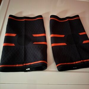 Modvel Knee compression Sleeves. Size XXL.  Tried on, never used.  Navy/orange